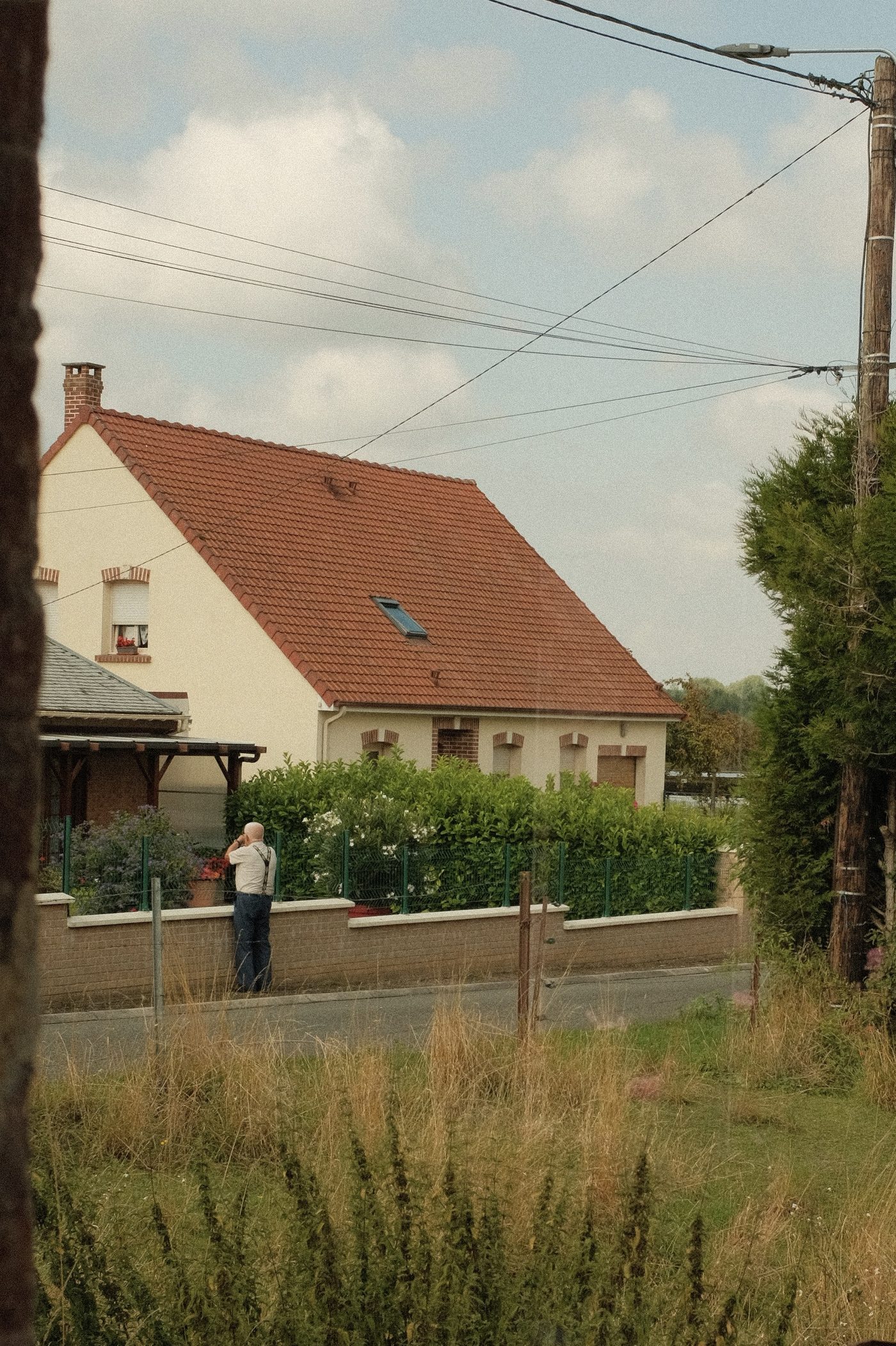 The neighbour photographs back