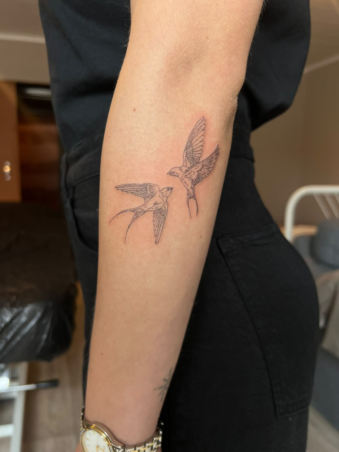 Fine-line swallows tattoo by Linéa D'amore